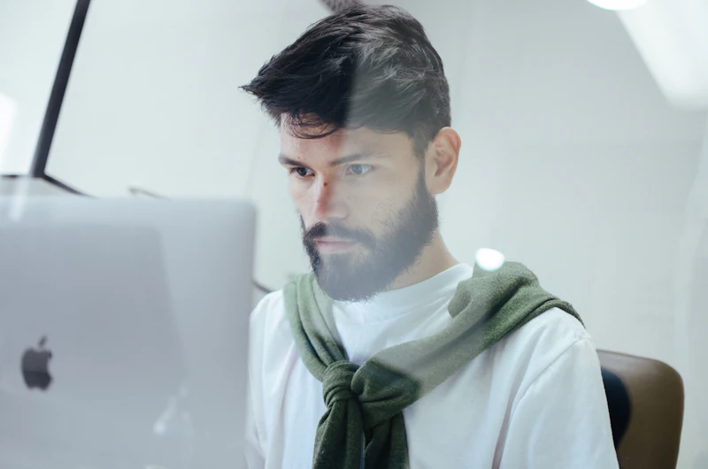 Developer looking intently at his screen